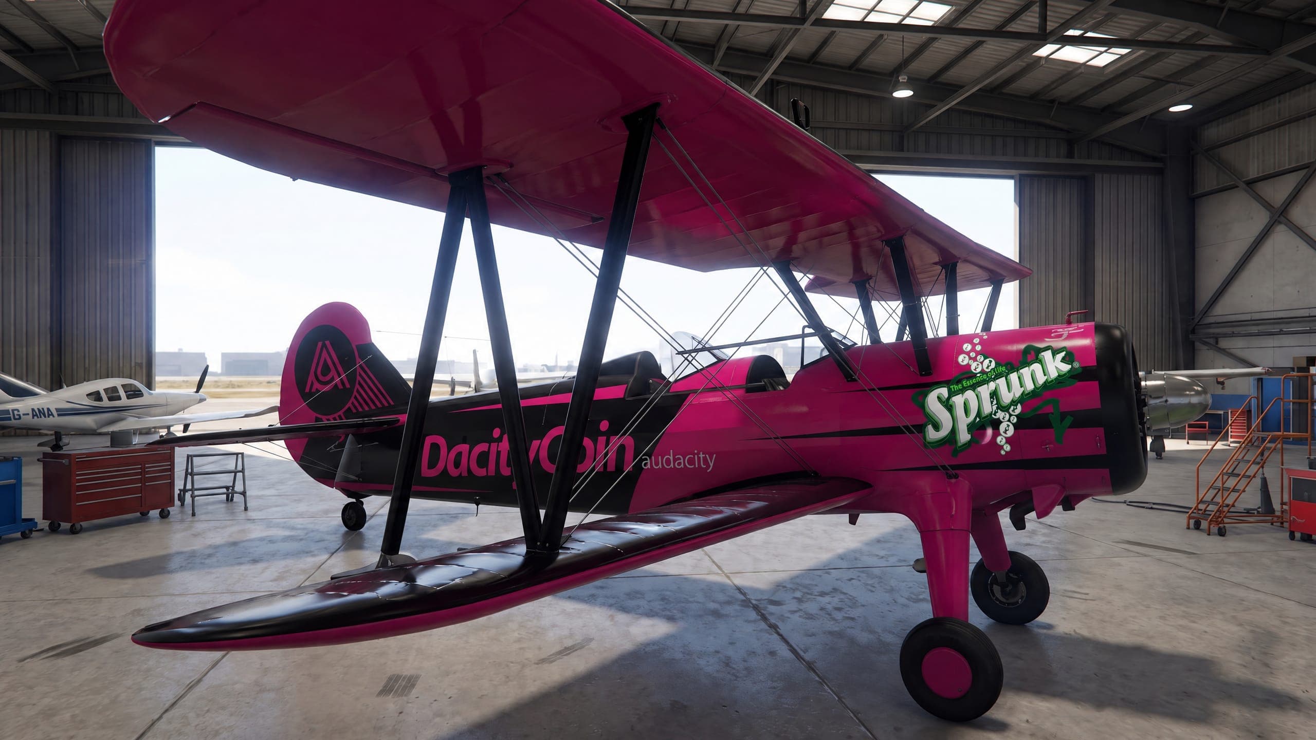 The pink DacityCoin stunt plane in a hangar with Sprunk on the nose